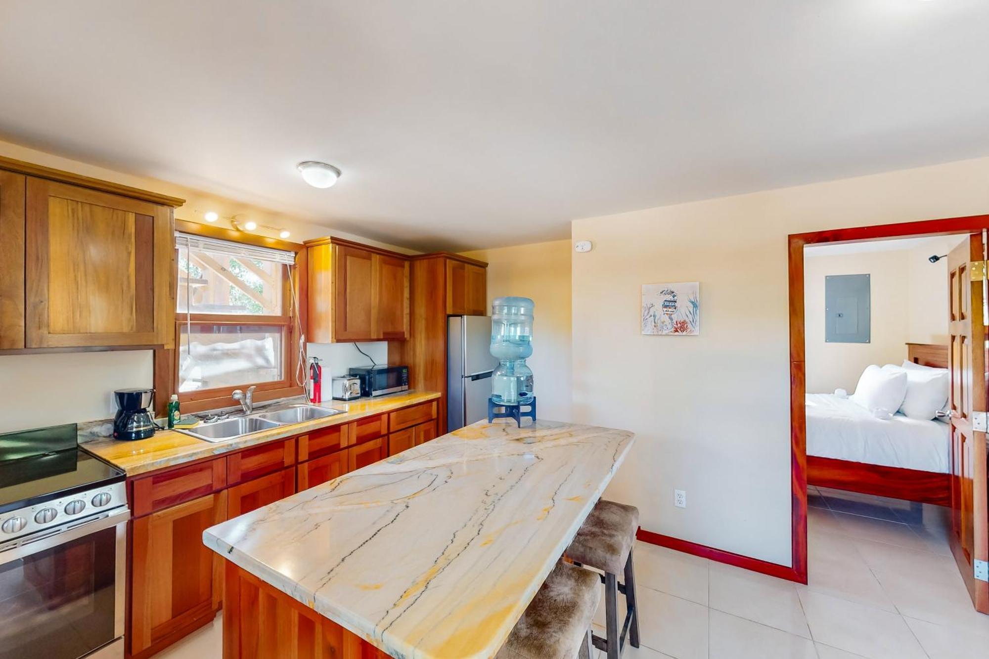 The At Island Pearl Gold Standard Certified * Caye Caulker